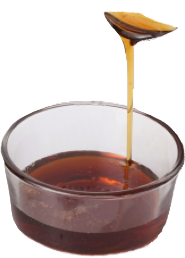maple syrup pouring into small bowl